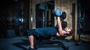 In one-arm dumbbell bench press, it's a so-called unilateral exercise. The left and right sides of the body are trained separately.