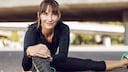A woman exercises outdoors