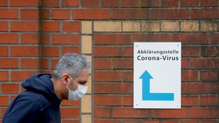 A man wearing a protective mask at the COVID-19 testing site of Berlin's Charité hospital