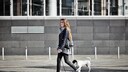 Woman Walks with Her Dog