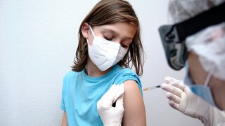 A child is vaccinated