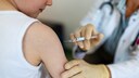 BioNTech Vaccine for Children Ages Five and Up: Young Boy Receives a Shot