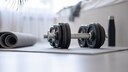 Children's Sports Equipment: Dumbbells and a Mat