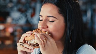 Too Much Protein: Woman Eats Egg Sandwich