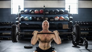 Man Engages in Strength Training