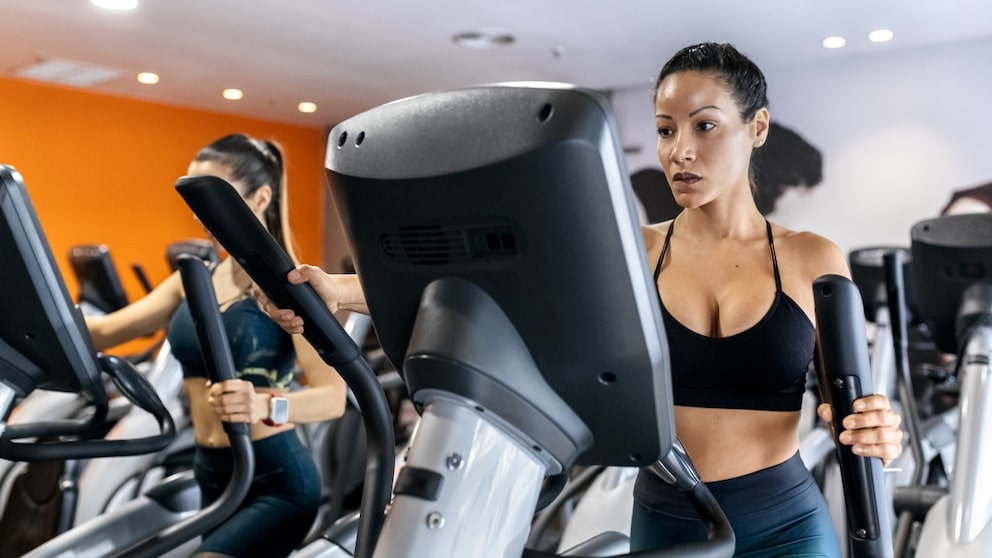 Woman on a cross trainer