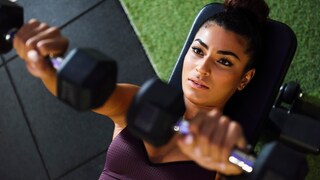 Woman doing chest press