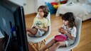 Children eat in front of the TV