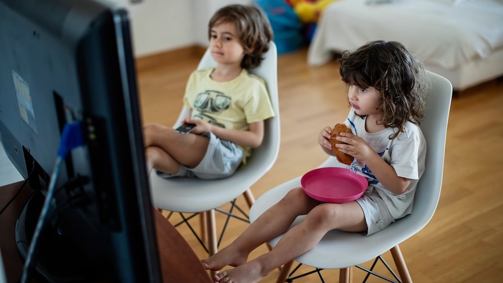 Children eat in front of the TV