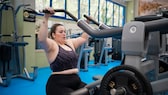 Fitness is important for your health: Woman in the gym