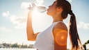 A woman drinks water
