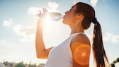 A woman drinks water