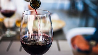 Strong red wine is usually served with dishes containing roasted beef or pork