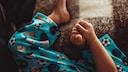 The illness primarily affects children under the age of 10, but adults can also become infected.