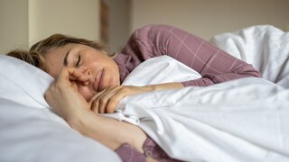Woman sleeping on her side