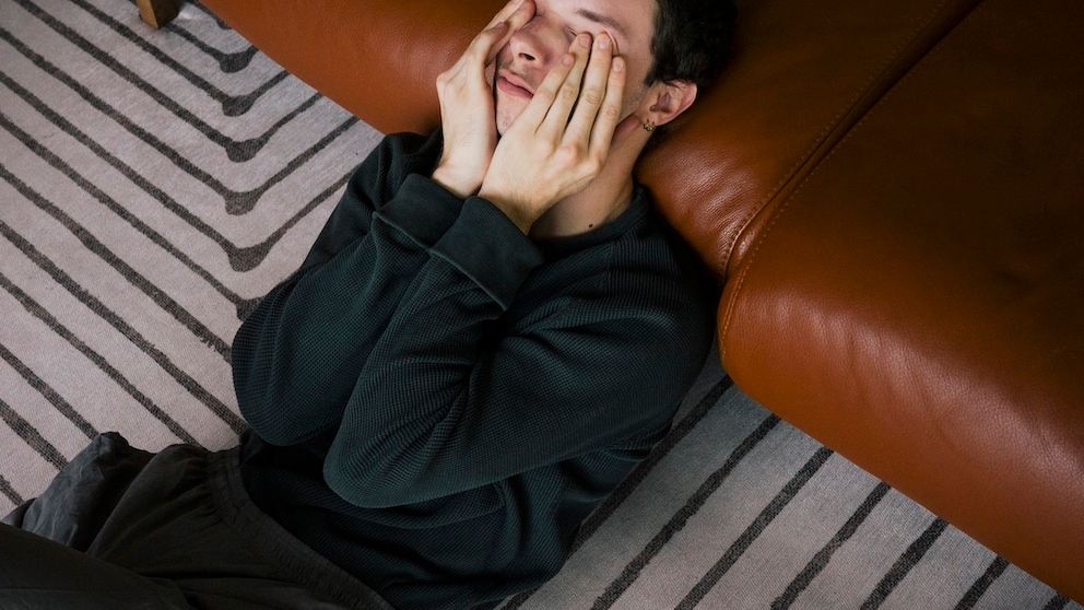 Young man with a headache