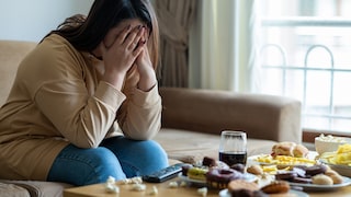 Unhappy woman before her meal: There is a link between a meat-free diet and the likelihood of developing depression