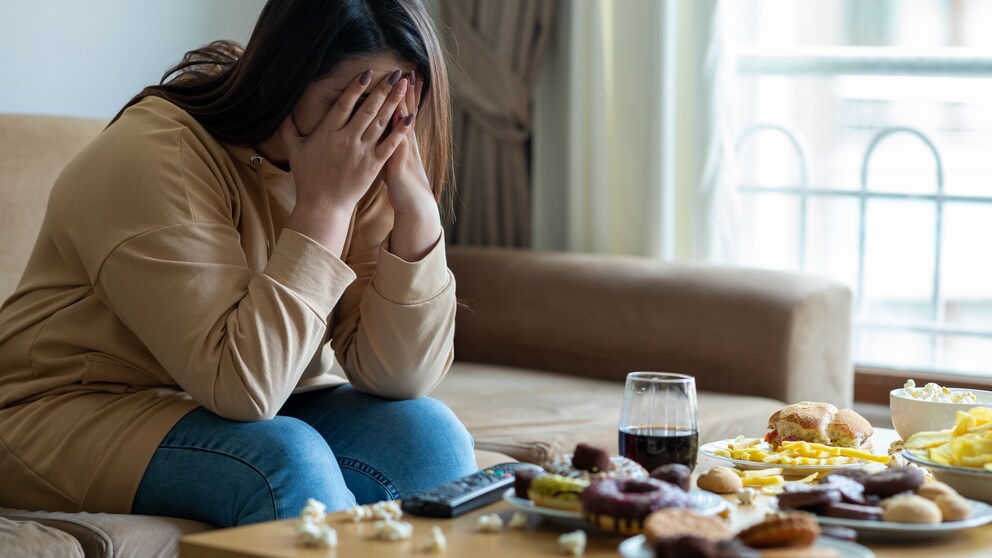 Unhappy woman before her meal: There is a link between a meat-free diet and the likelihood of developing depression