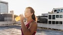 Athlete drinks isotonic drink