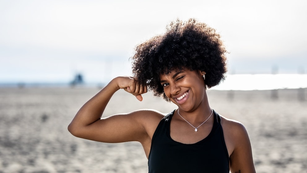Woman Shows Off Her Arm Muscles