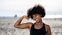 Woman Shows Off Her Arm Muscles
