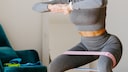 Instead of dumbbells, you can perform leg exercises with a resistance band.