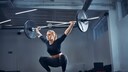 The overhead squat is a challenging variation of the traditional squat.