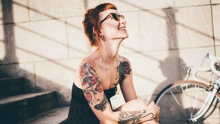 A Woman with Red Tattoos
