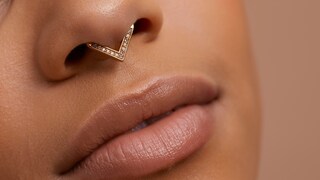 Scar tissue, known as "proud flesh," can form around piercings.