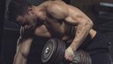Man Trains at the Gym