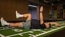 The Dead Bug exercise strengthens the core and shapes the six-pack.