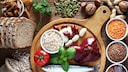 Fish, liver, beans, bread, etc., on a table