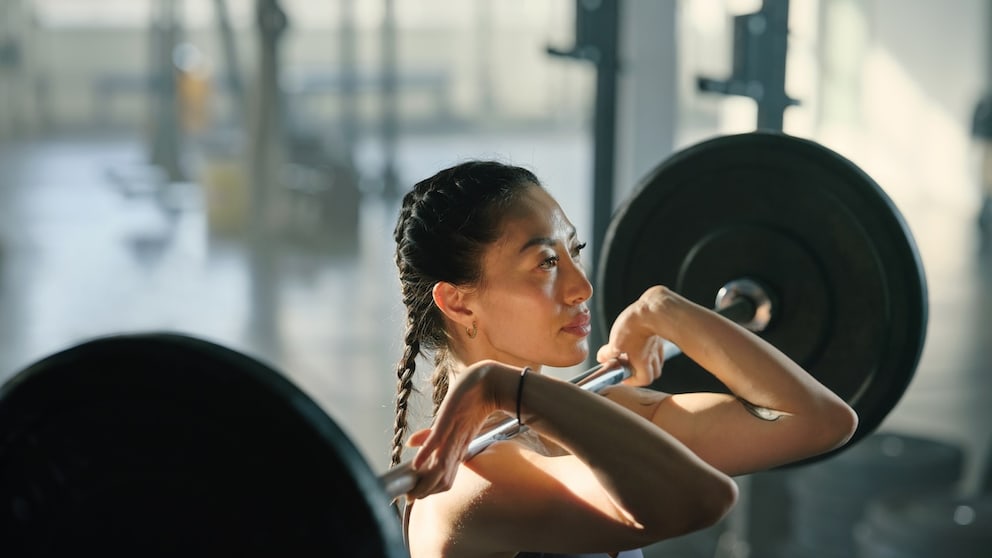 Woman Lifts Weights