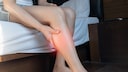 Woman Holds Leg