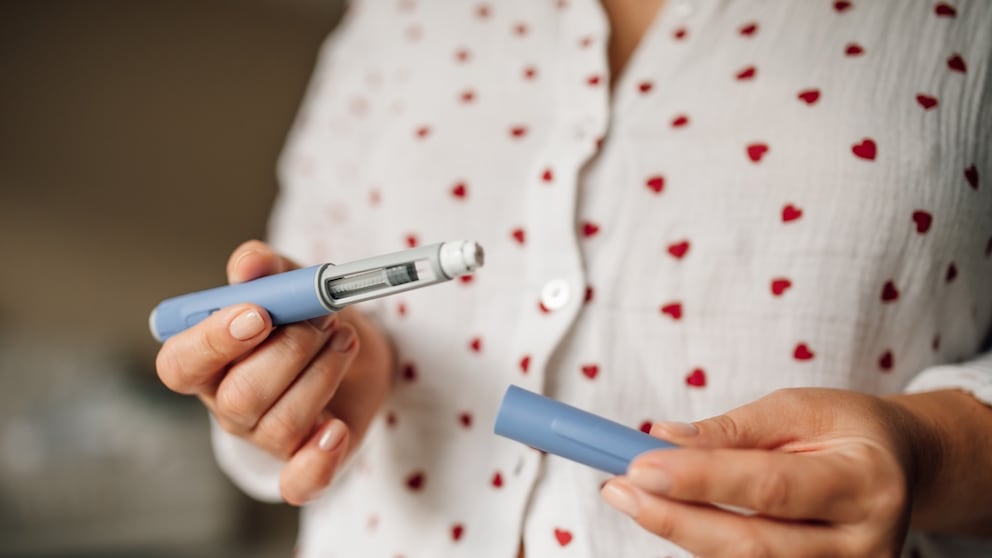 Woman with syringe