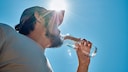 Man Drinks Water