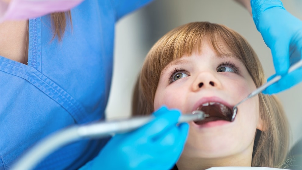 Child with Cavities Receives Treatment with Silver Diamine Fluoride