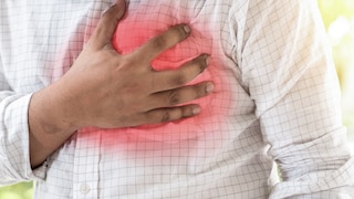 Man Holds Heart