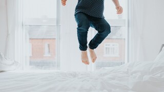 Child Jumps on Mattress