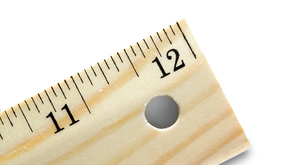 Ruler with hole