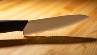 Ceramic Knife: Close-Up of a Ceramic Knife with a Brittle Blade