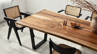 A naturally styled setting with a unique dining table