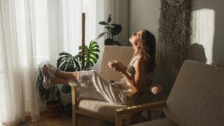 Woman Enjoys Her Coffee