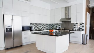 Modern Kitchen with White and Black Island
