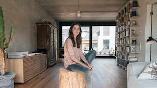 Woman in a sustainably furnished living room