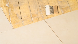 When tiling over wood, it's important to use a flexible adhesive.