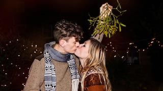 Some people kiss under a mistletoe at Christmas. But what is the story behind this tradition?
