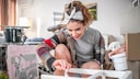 Woman Paints Stool with White Chalk Paint