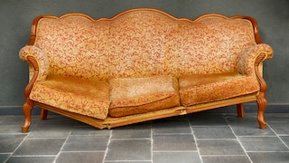 Old, broken sofa