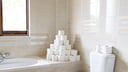 This is not how it should be done. Toilet paper should not be stored openly next to the shower.